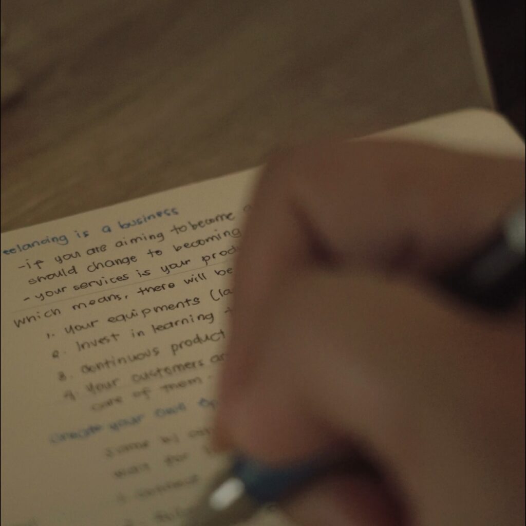 writing in notebook